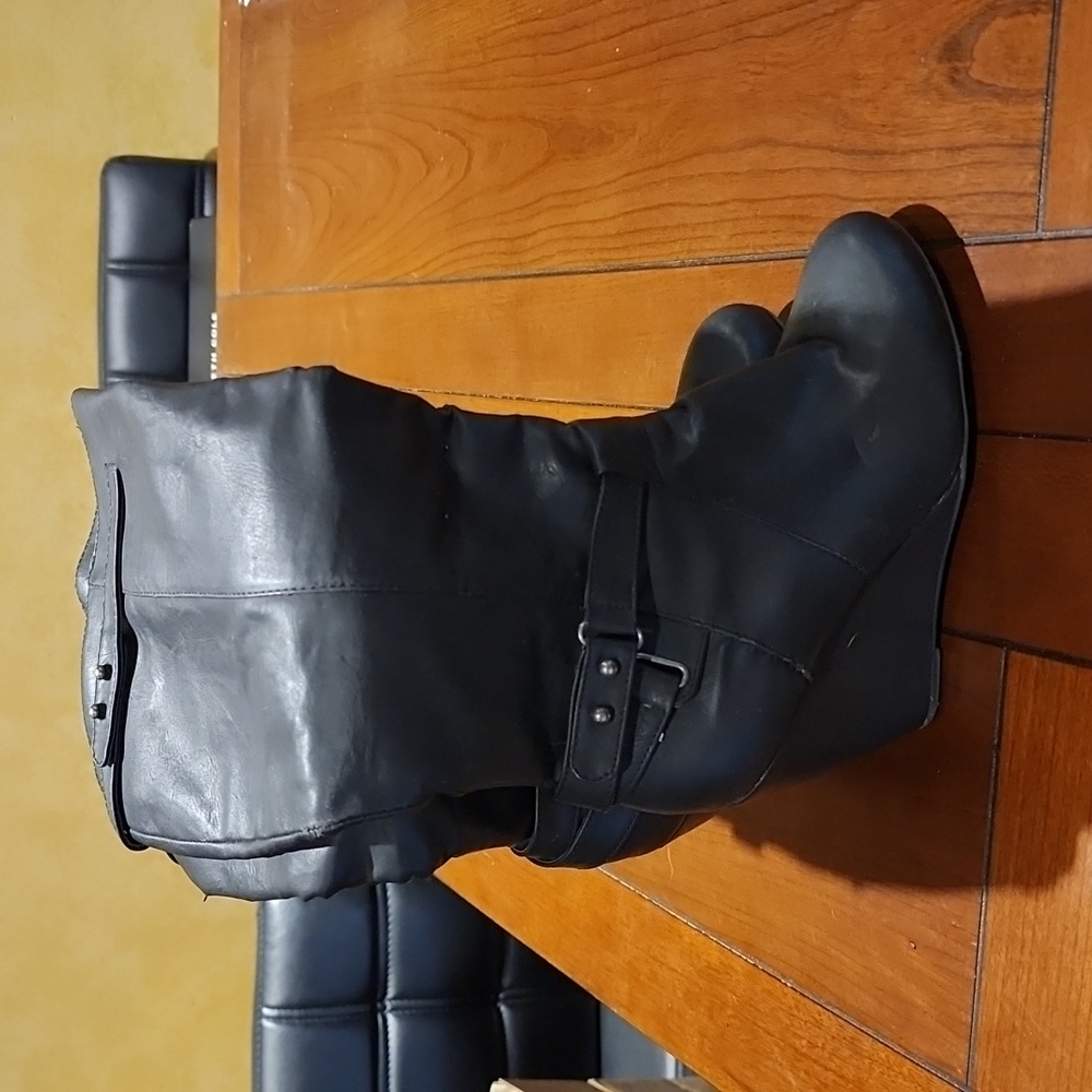 Tall black wedge boots